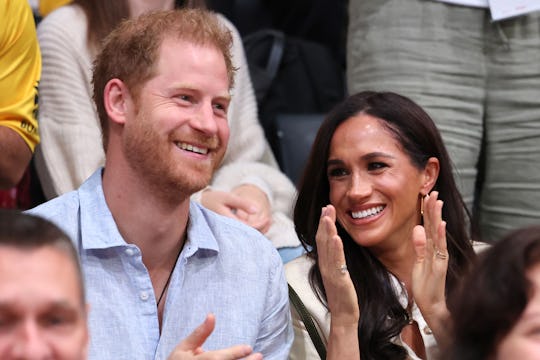 DUESSELDORF, GERMANY - SEPTEMBER 15: Prince Harry, Duke of Sussex and Meghan, Duchess of Sussex sit ...