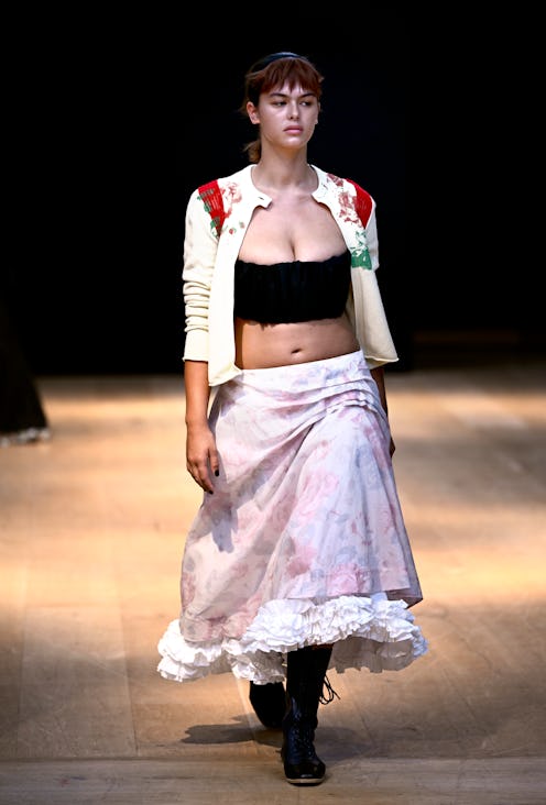 A model walks the runway at the Molly Goddard show