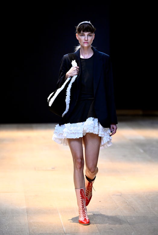 A model walks the runway at the Molly Goddard show 