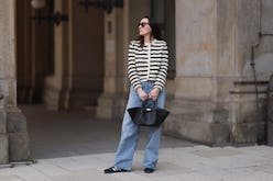 HAMBURG, GERMANY - MAY 09: Elise Seitz seen wearing Bottega Veneta black shades, Celine black belt, ...