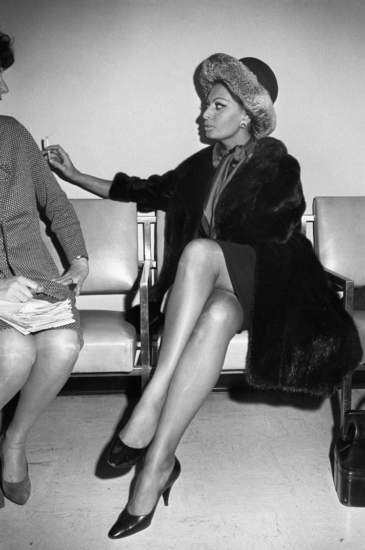 Sophia Loren brightens the New York scene on her arrival Dec. 20. Here for the premiere of "Dr. Zhiv...