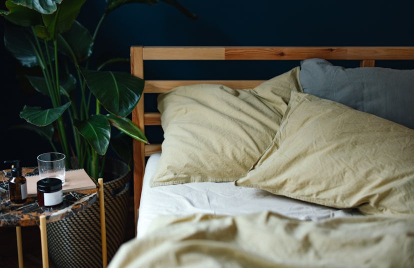 High angle view of an unmade bed in the morning.