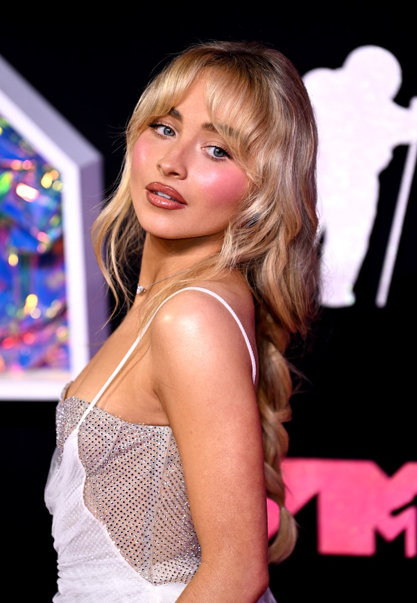 Sabrina Carpenter's butterfly haircut is a top fall 2023 hair trend, according to stylists.