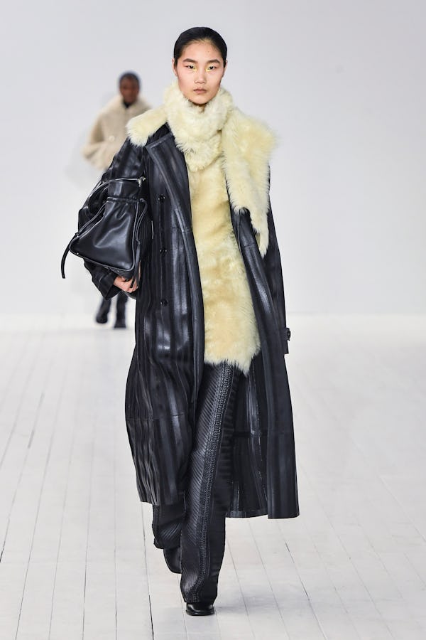 A model walks the runway in a leather jacket during the Chloe Ready to Wear Fall/Winter 2023-2024 fa...