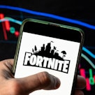 CHINA - 2021/12/09: In this photo illustration the online video game by Epic Games company Fortnite ...