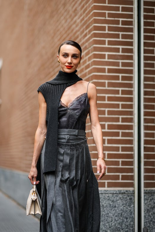 Sleek side parts are a Milan Fashion Week Spring/Summer 2024 street style beauty trend