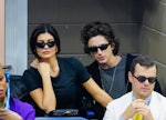 NEW YORK, NEW YORK - SEPTEMBER 10:  Kylie Jenner and Timothée Chalamet are seen at the Final game wi...