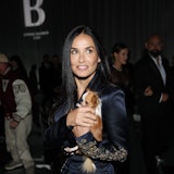 Demi Moore attends the Versace fashion show during the Milan Fashion Week Womenswear Spring/Summer 2...