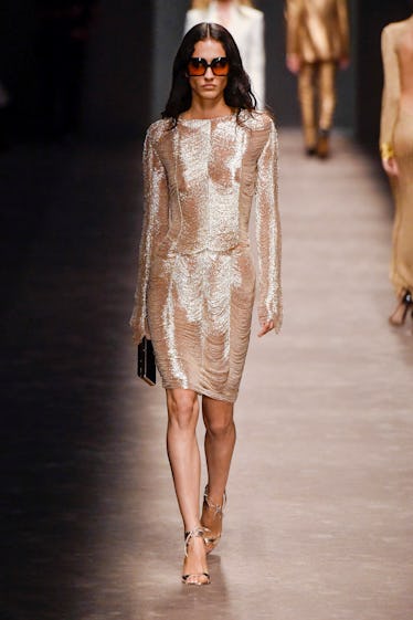 MILAN, ITALY - SEPTEMBER 21: A model walks the runway during the Tom Ford Ready to Wear Spring/Summe...