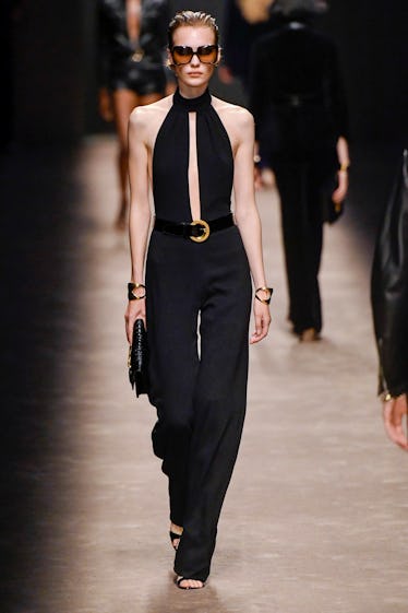 MILAN, ITALY - SEPTEMBER 21: A model walks the runway during the Tom Ford Ready to Wear Spring/Summe...