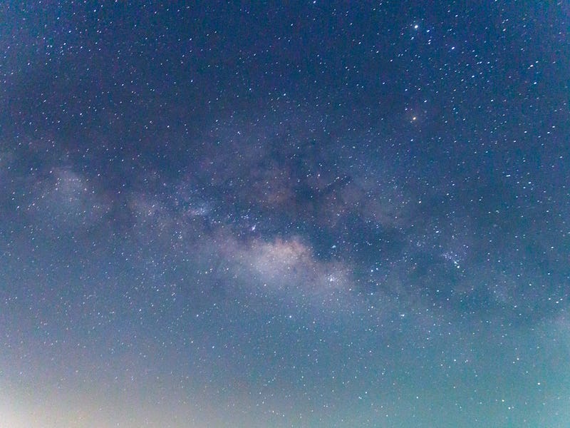 Milky way galaxy has stars and space dust in the universe.