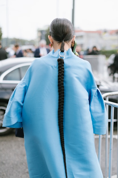 Braided ponytails are a Milan Fashion Week Spring/Summer 2024 street style beauty trend