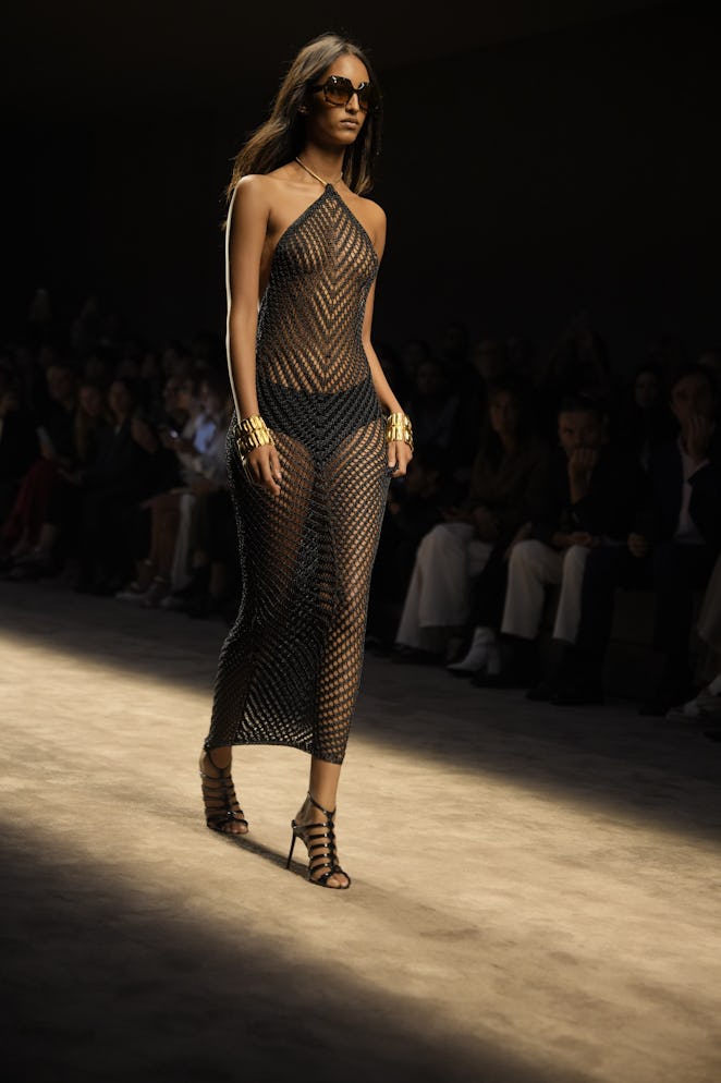 (EDITORS NOTE: Image contains partial nudity.) A model walks the runway at the Tom Ford Spring 2024 ...