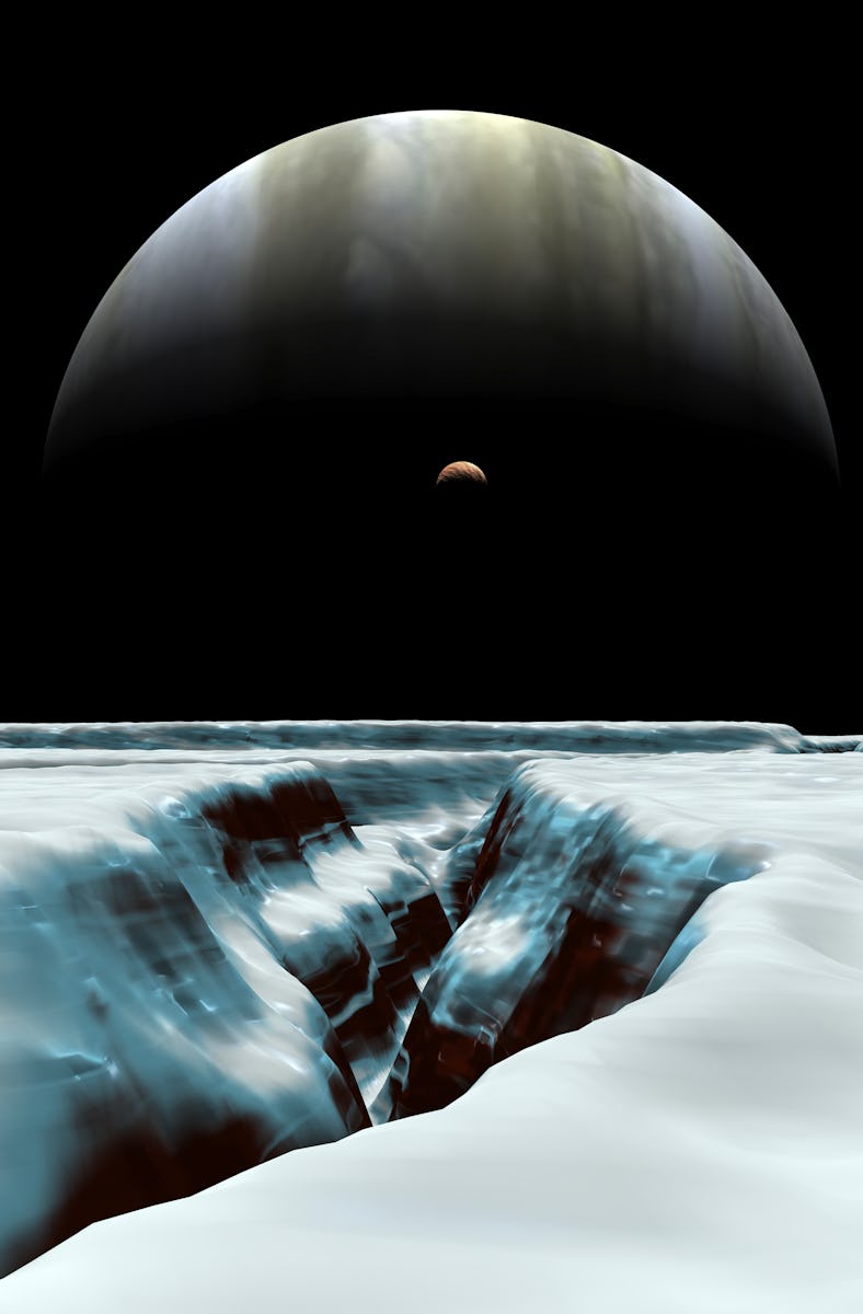 A crescent Jupiter hovers near the horizon along with Jupiter's volcanic satellite Io. In the foregr...