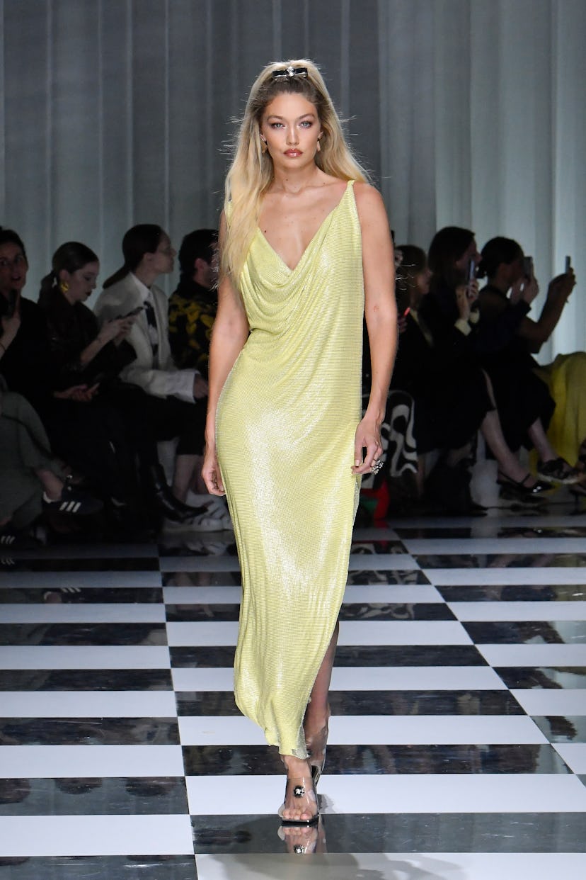 Gigi Hadid walks the runway during the Versace Ready to Wear Spring/Summer 2024 fashion show.