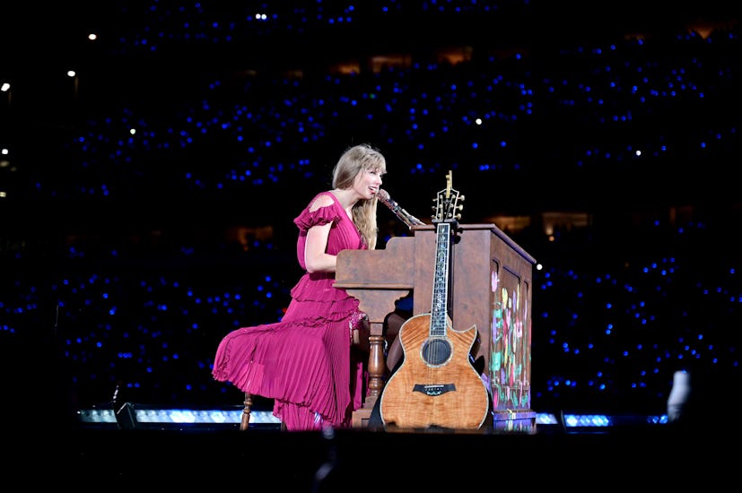 Taylor Swift, a football fan, performs onstage during The Eras tour. 