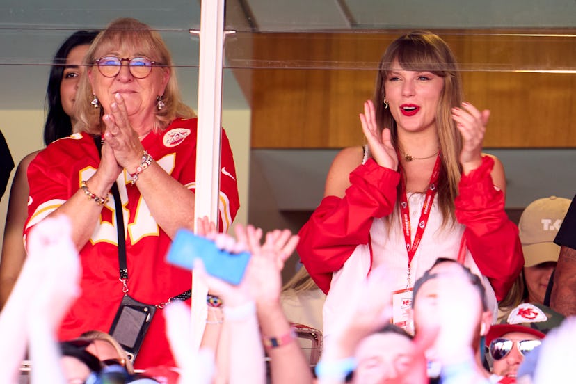 Taylor Swift cheers from a suite as the Kansas City Chiefs football team play the Chicago Bears.
