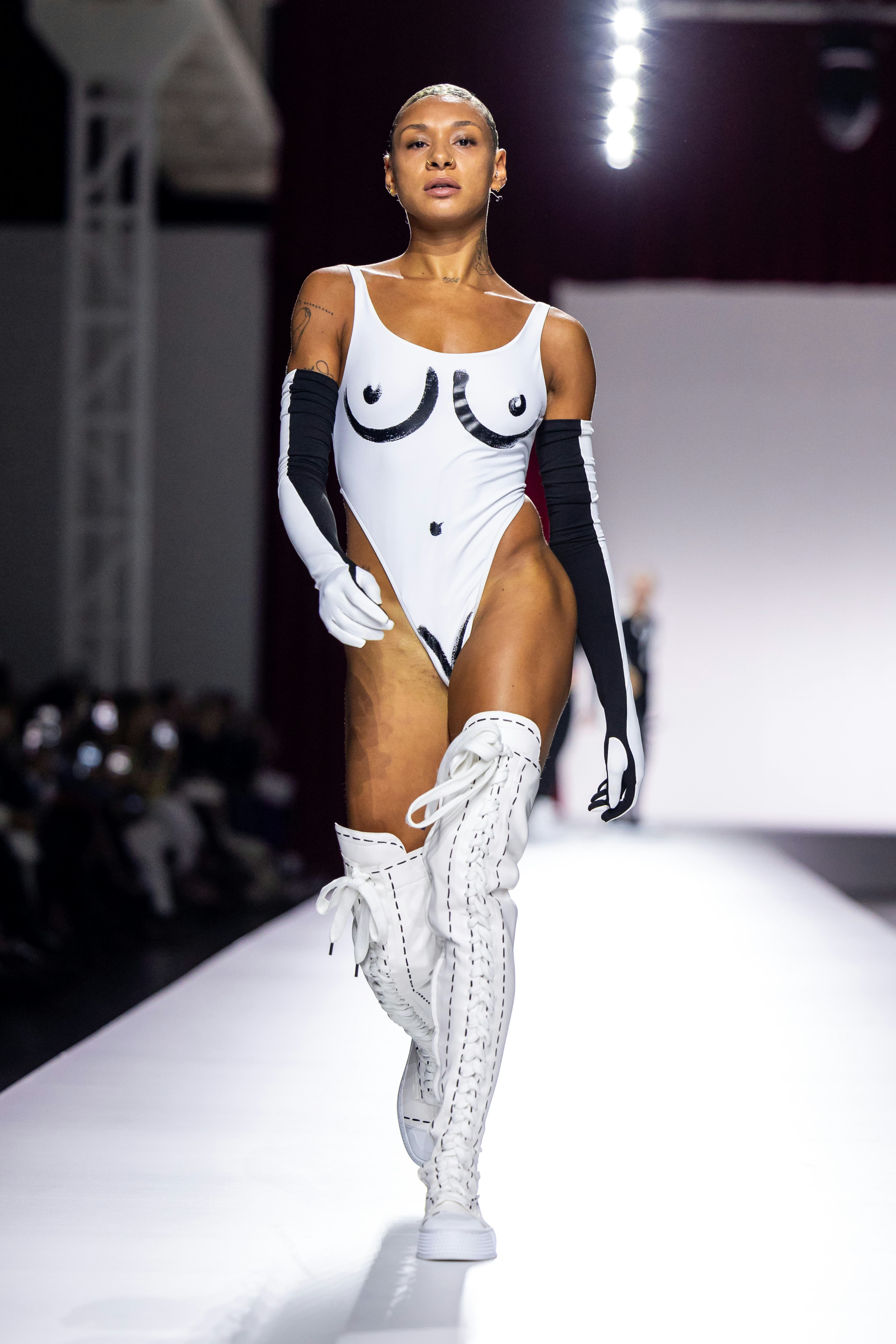 A model walks the runway at the Moschino fashion show during the Milan Fashion Week Womenswear Sprin&hellip;