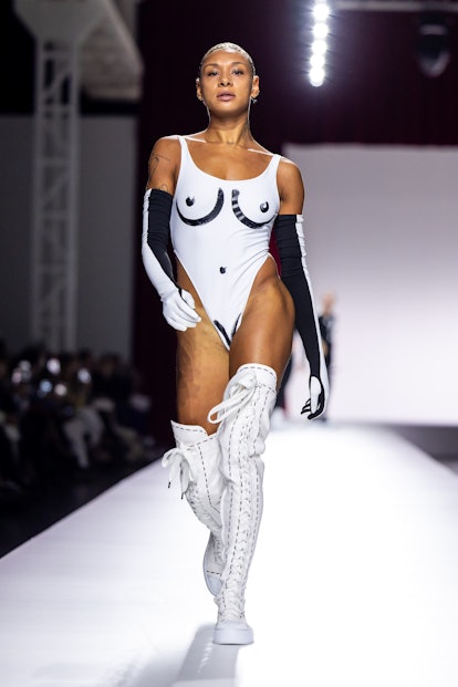 A model walks the runway at the Moschino fashion show during the Milan Fashion Week Womenswear Sprin...