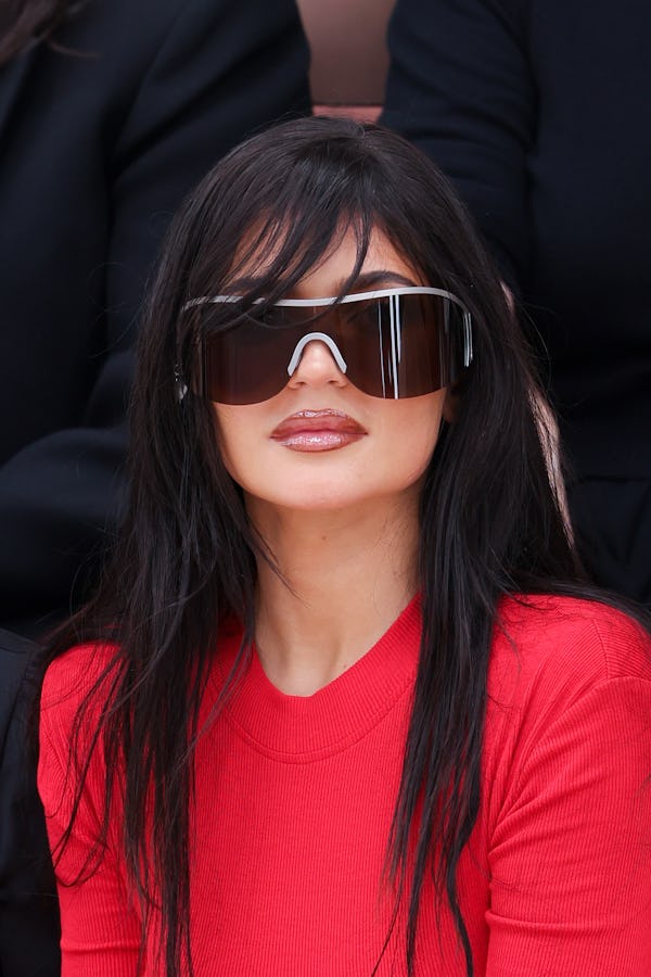 Kylie Jenner’s long bangs at Acne Studios Spring/Summer 2024 during Paris Fashion Week on September …