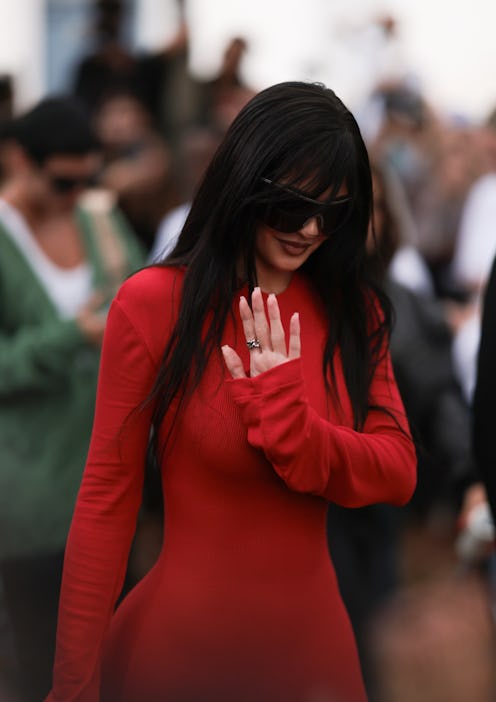 Kylie Jenner's long bangs at Acne Studios Spring/Summer 2024 during Paris Fashion Week on September ...