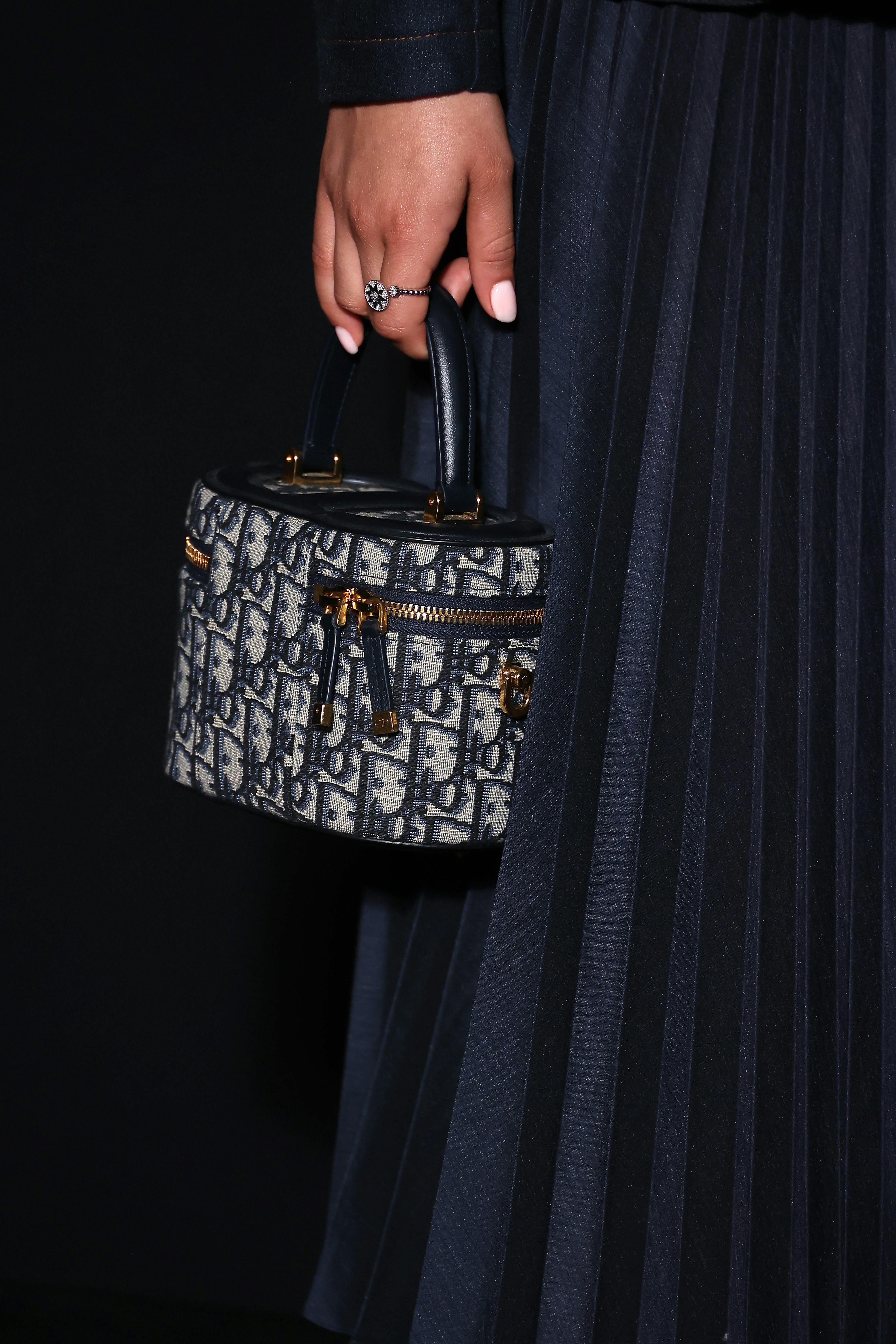 Jenna Ortega carries a monogrammed dior top-handle bag