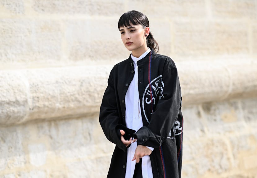 Baby bangs are a Paris Fashion Week Spring/Summer 2024 street style beauty trend