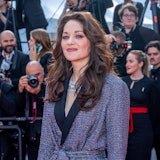 Marion Cotillard attends the "Firebrand (Le Jeu De La Reine)" red carpet during the 76th Cannes Film...