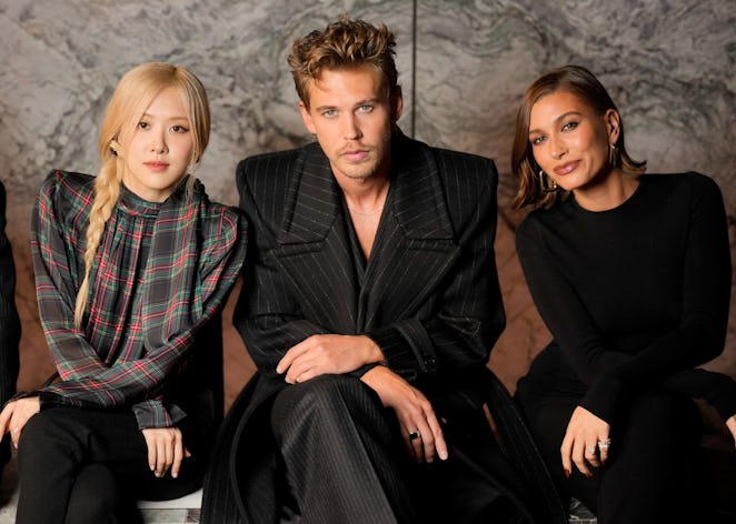Rosé of BLACKPINK, Austin Butler and Hailey Bieber at Saint Laurent Ready To Wear Spring 2024 held a...