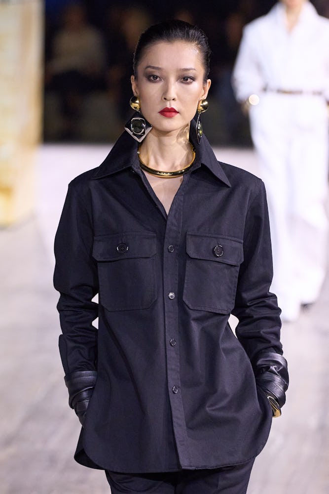 Saint Laurent model red statement lips Paris Fashion Week spring/summer 2024