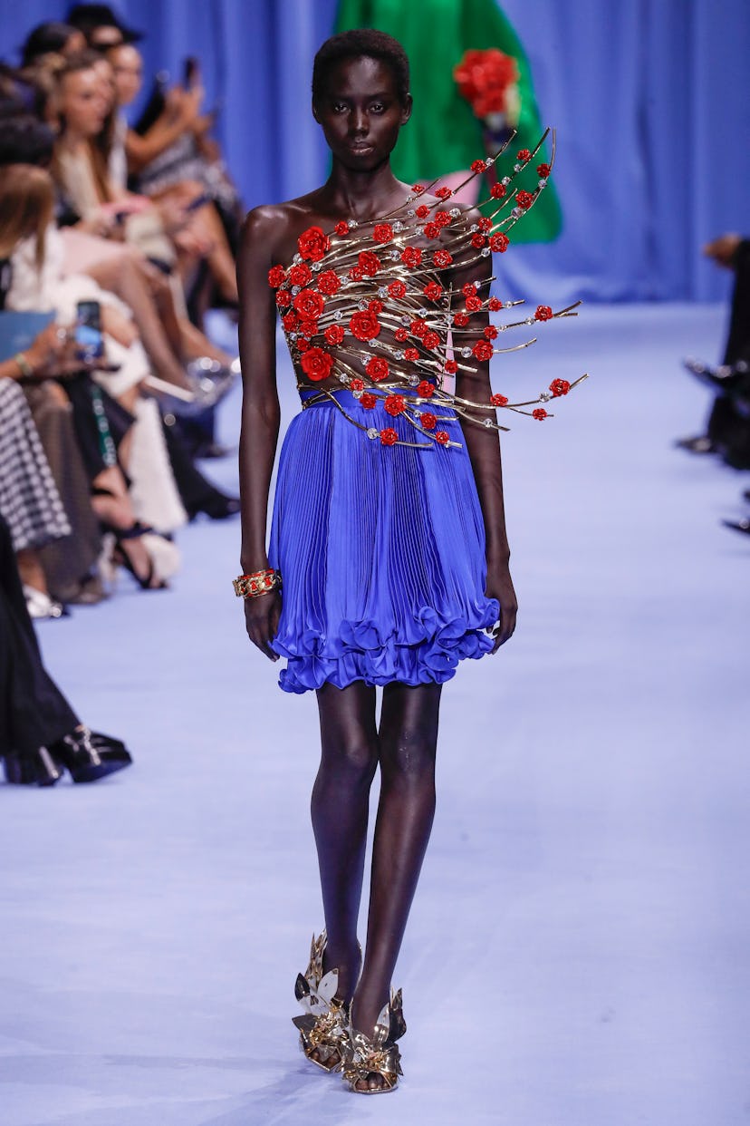 A model walks the runway during the Balmain Ready to Wear Spring/Summer 2024 fashion show. 