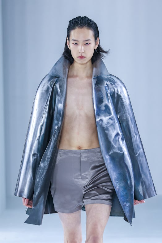 A model walks the runway during the Loewe Menswear Fall-Winter 2023-2024 show as part of Paris Fashi...