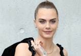 MILAN, ITALY - SEPTEMBER 21: Cara Delevingne attends the Emporio Armani fashion show during the Mila...