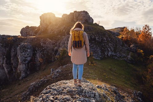 Woman hiking in the mountains.