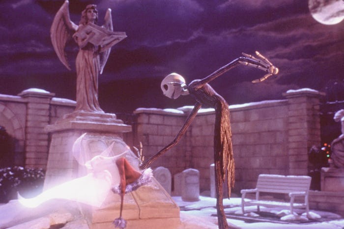 370100 03: Hat in hand, a sadder-but-wiser Jack Skellington gets a boost from his ghost dog, Zero, w...