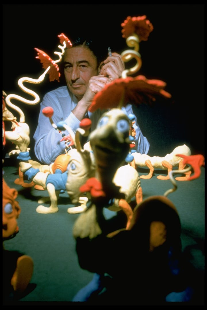 1959: Children's book author/illustrator Theodor Seuss Geisel poses with models of some of the chara...