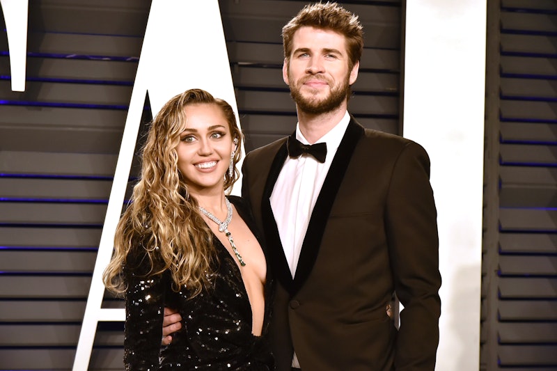 BEVERLY HILLS, CALIFORNIA - FEBRUARY 24: Liam Hemsworth and Miley Cyrus attend the 2019 Vanity Fair ...