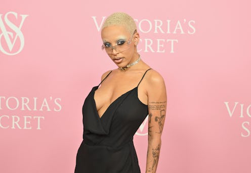 US rapper Doja Cat's bleach blonde hair & brown 1990s lip liner at the Victoria's Secret New York Fa...