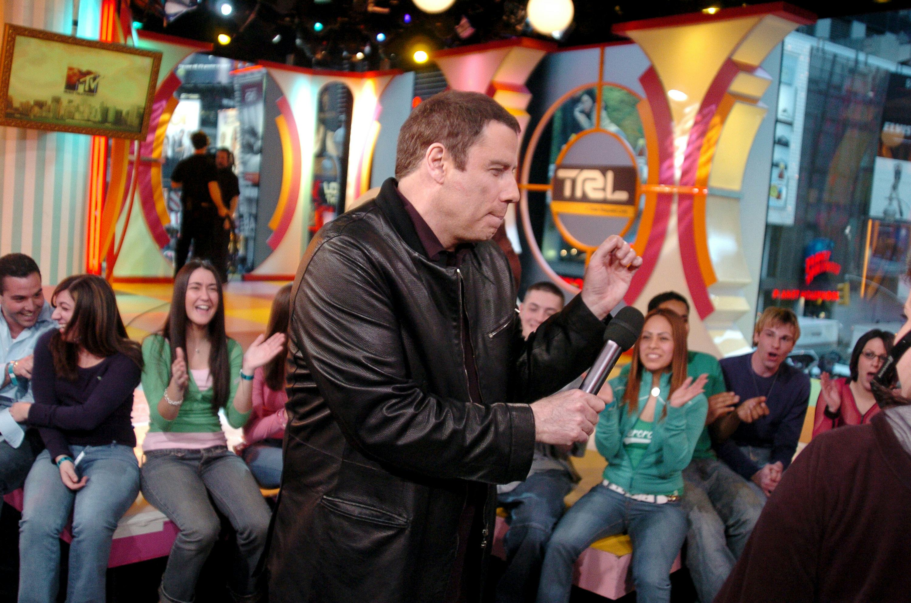 John Travolta during John Travolta and Rachel Bilson Visit MTV&rsquo;s &ldquo;TRL&rdquo; - February 23, 2005 at MTV St&hellip;