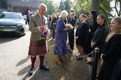 CRATHIE, ABERDEENSHIRE - SEPTEMBER 8: King Charles III and Queen Camilla meet estate staff and membe...