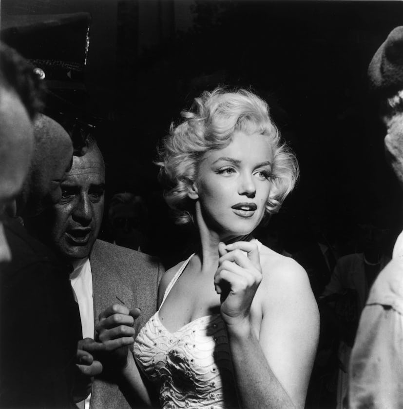 The late Marilyn Monroe was known for her short blonde hair, styled with voluminous curls.