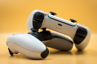 Two dualsense controllers of the Playstation 5.