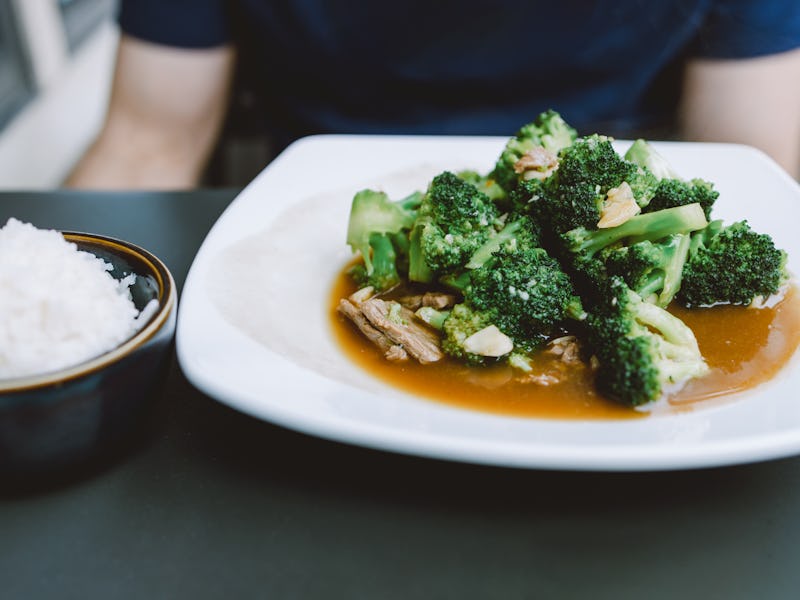 Close-up of beef and broccoli dish with white rice at Thai restaurant