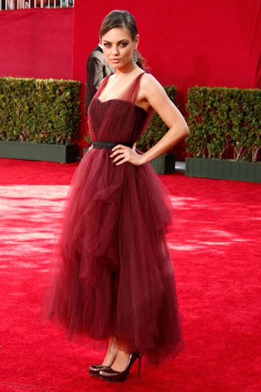 Mila Kunis arrives at the 61st Primetime Emmy Awards 