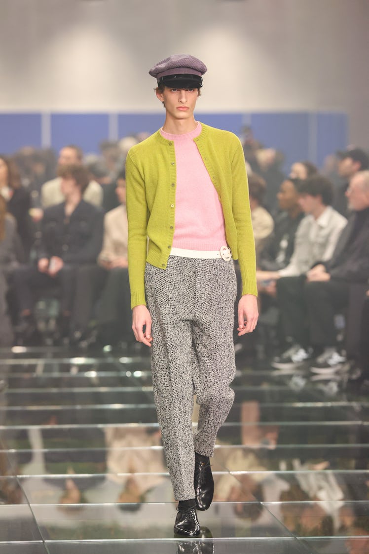 MILAN, ITALY - JANUARY 14: A model walks the runway at the Prada fashion show during the Milan Mensw...