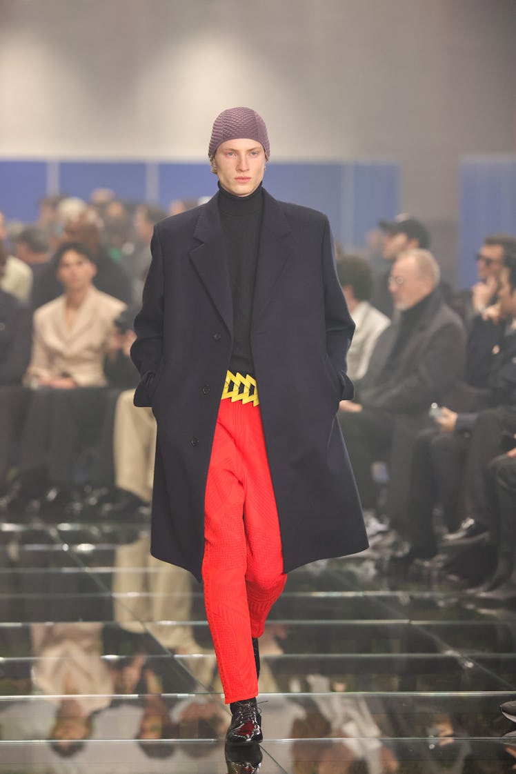 MILAN, ITALY - JANUARY 14: A model walks the runway at the Prada fashion show during the Milan Mensw...