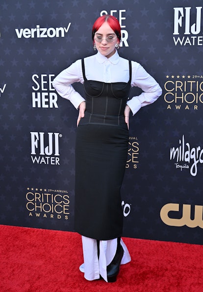Billie Eilish wore a Thom Browne dress and button-down as her 2024 Critics Choice Awards outfit.