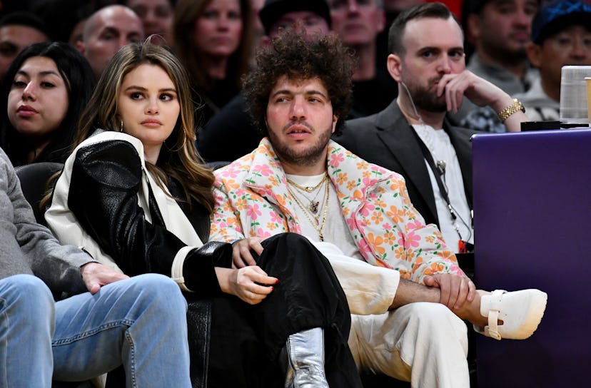 LOS ANGELES, CALIFORNIA - JANUARY 03: Selena Gomez and Benny Blanco attend a basketball game between...