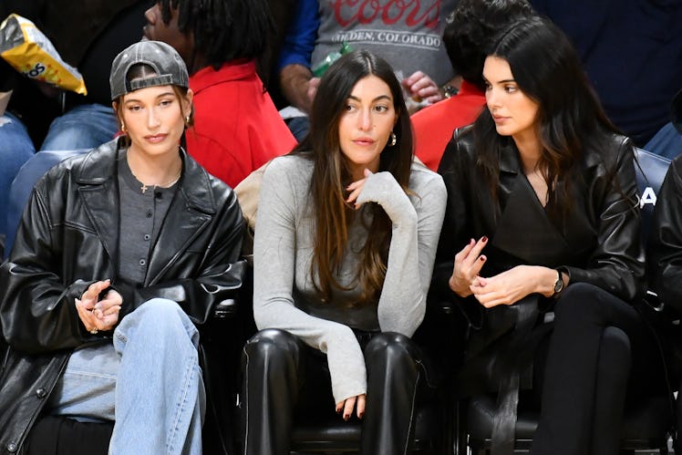 Hailey Bieber, Sarah Staudinger and Kendall Jenner attend a basketball game between the Los Angeles ...