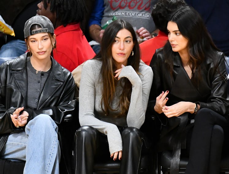 Hailey Bieber, Sarah Staudinger and Kendall Jenner attend a basketball game between the Los Angeles ...